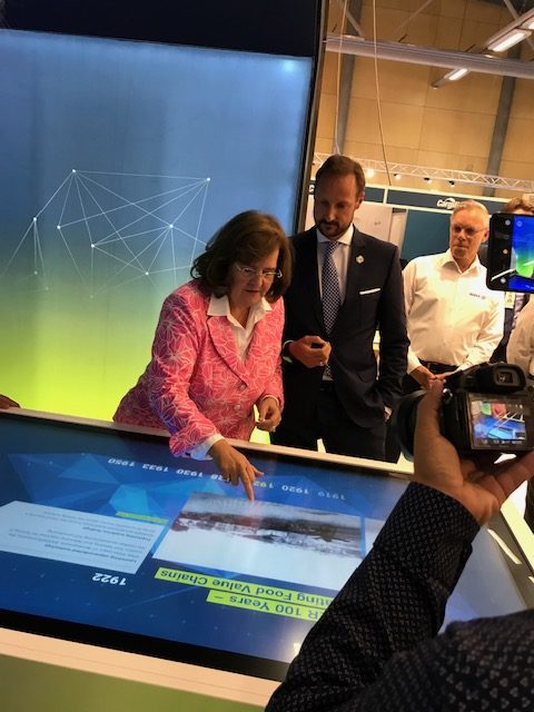 Petra Baader explains her company's development to Crown Prince Haakon during the opening day of Aqua Nor yesterday