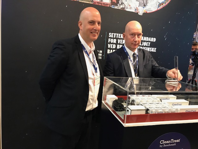 Benchmark's John Marshall and Neil Robertson with a model of the winning CleanTreat system at Aqua Nor