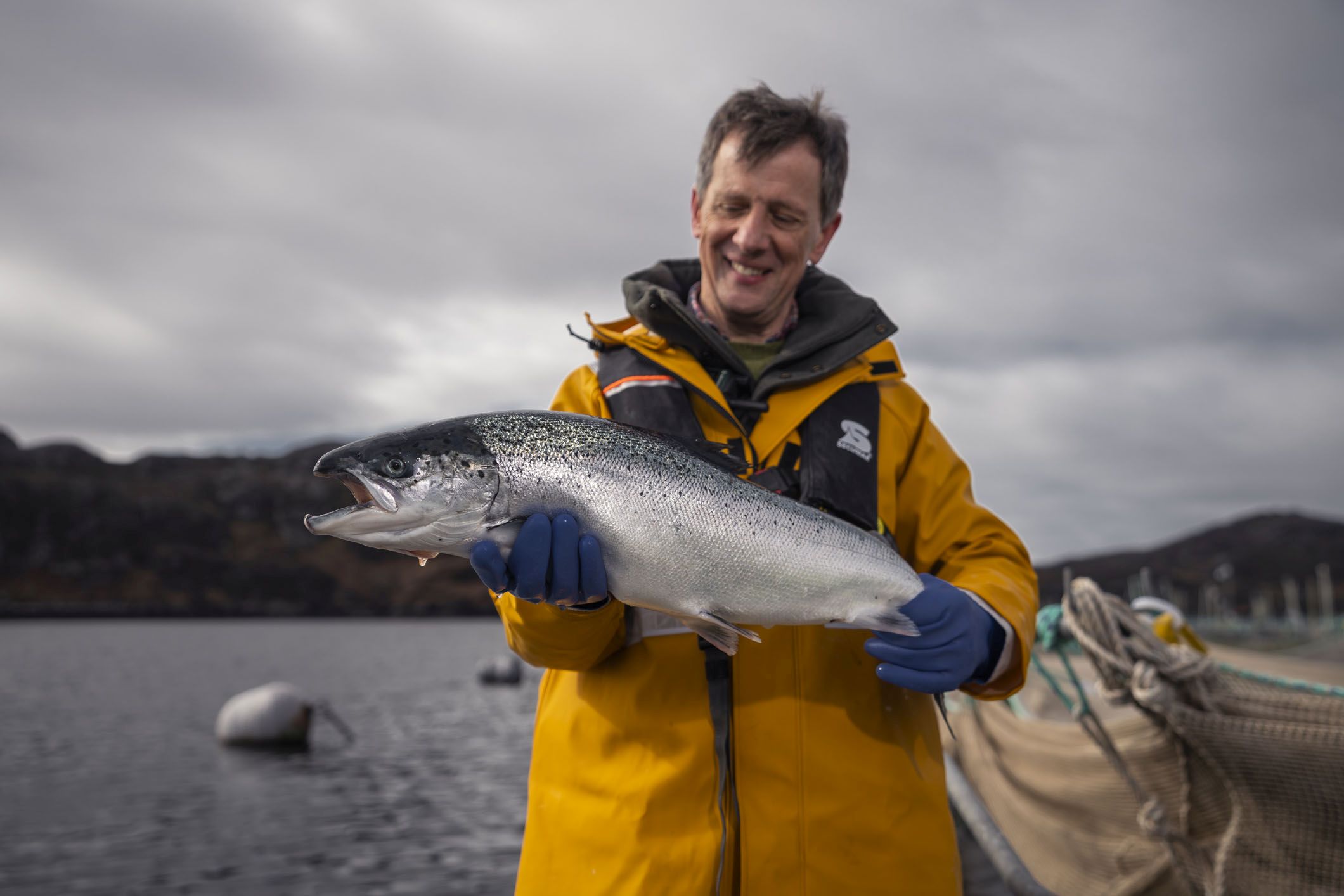 Loch Duart's Andy Bing with a healthy salmon - the company is involved in a gill health research project