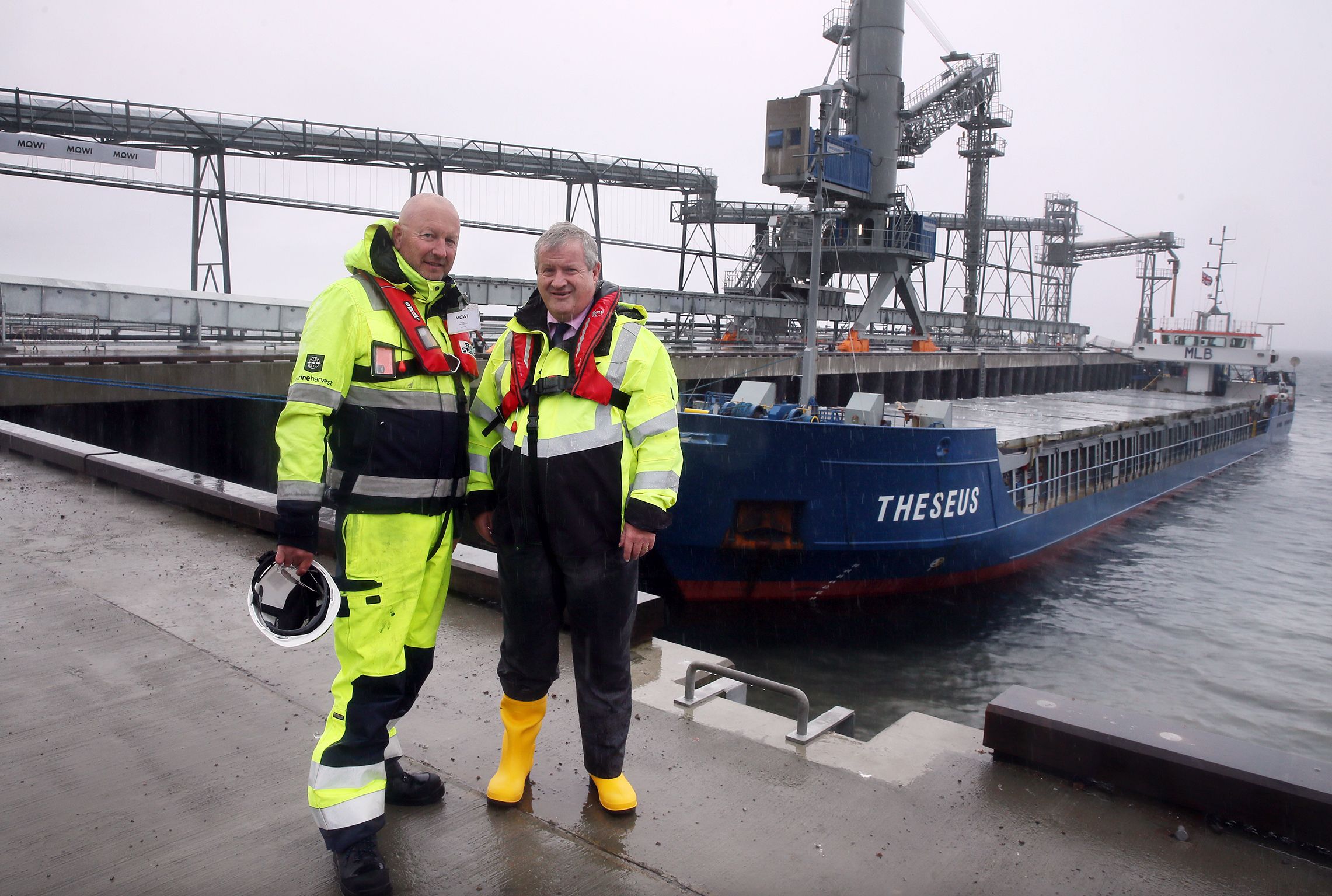 Mowi's Mick Watts (left) with Ian Blackford at the Kyleakin pier 
