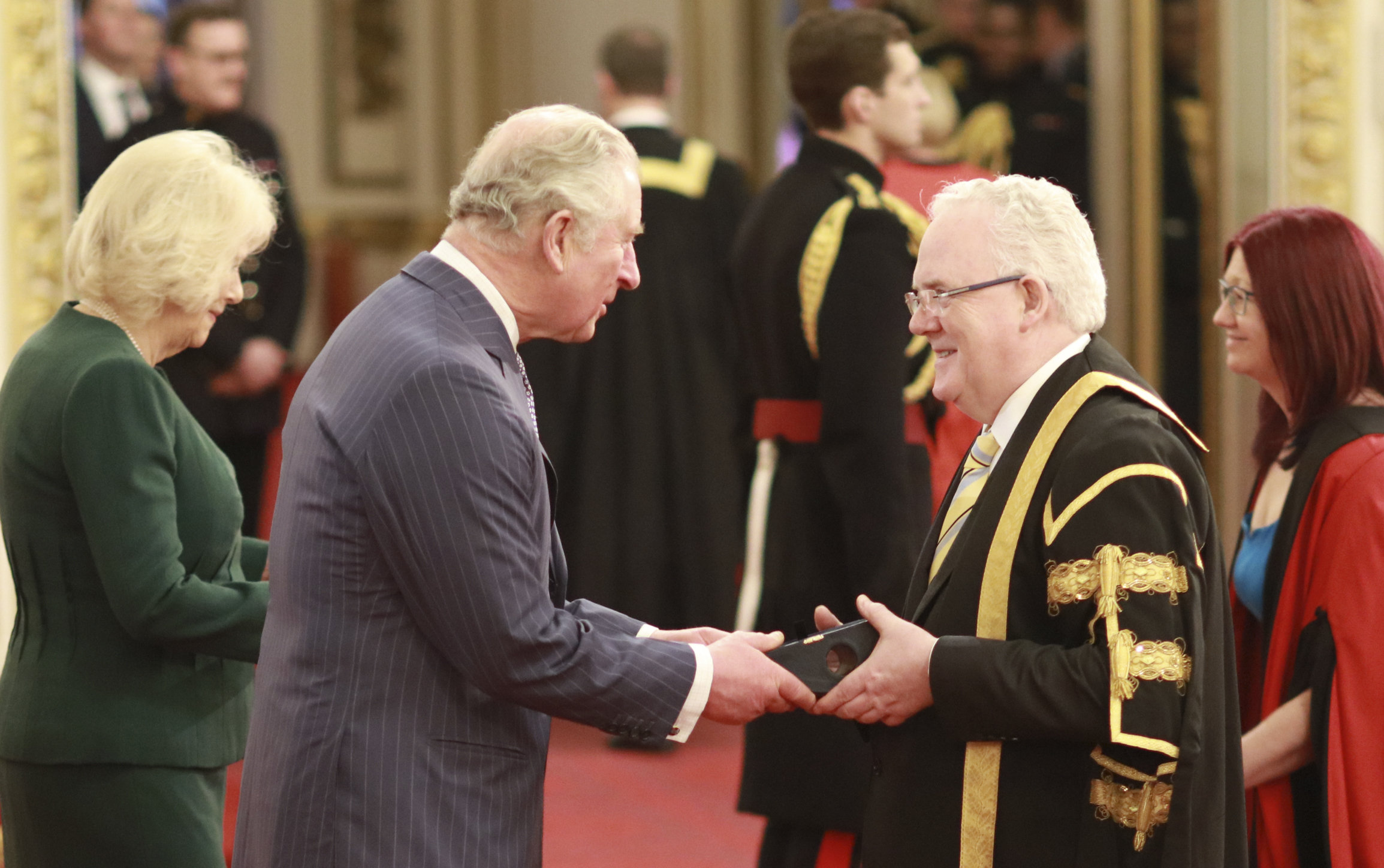 Professor Gerry McCormac and Professor Selina Stead receiving the Queen’s Anniversary Prize from the Duke and Duchess of Cornwall 