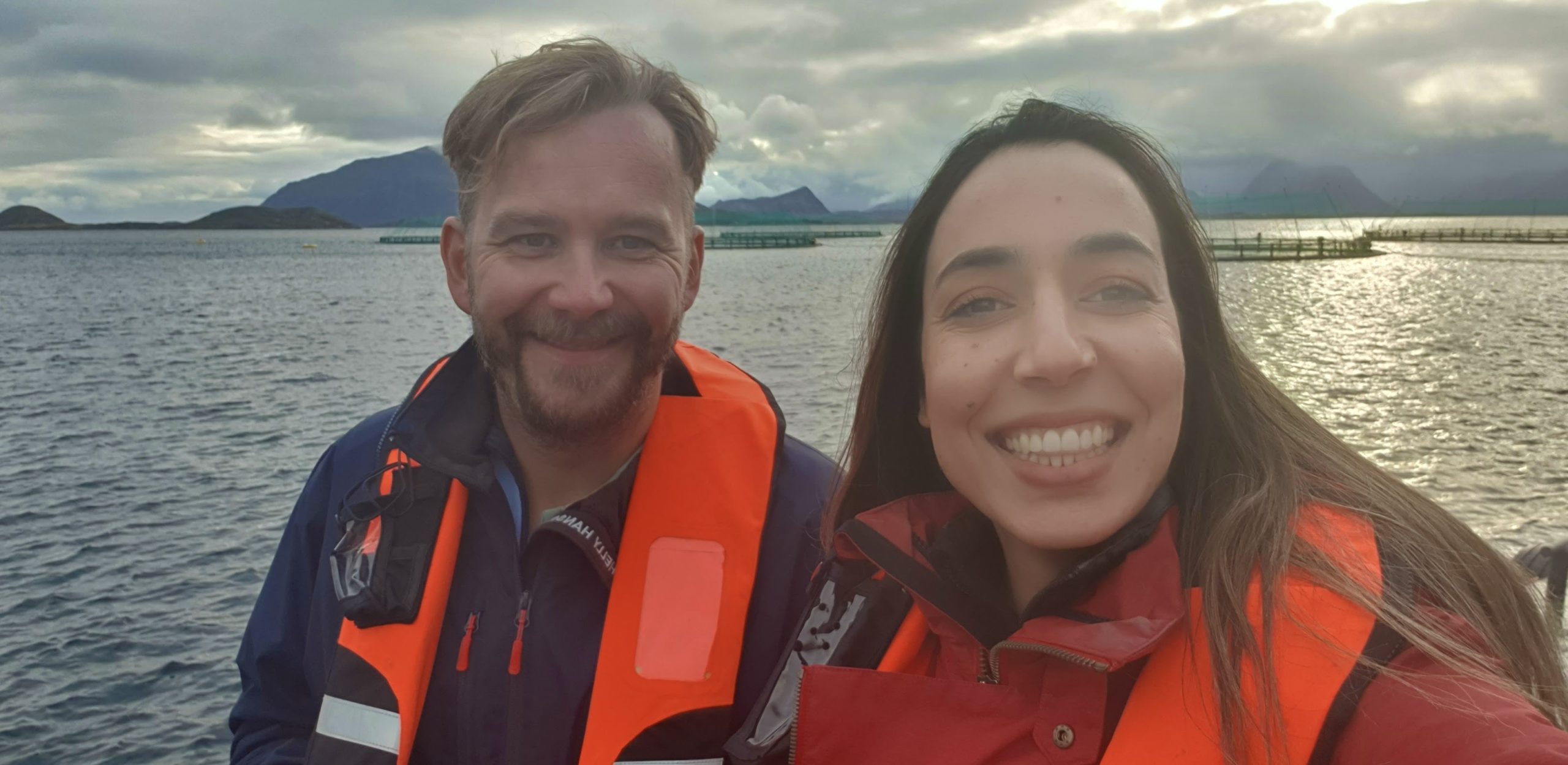 Scholarship recipient Marwa Mechlaoui with Kvarøy Arctic CEO Alf-Gøran Knutsen at the farm site 