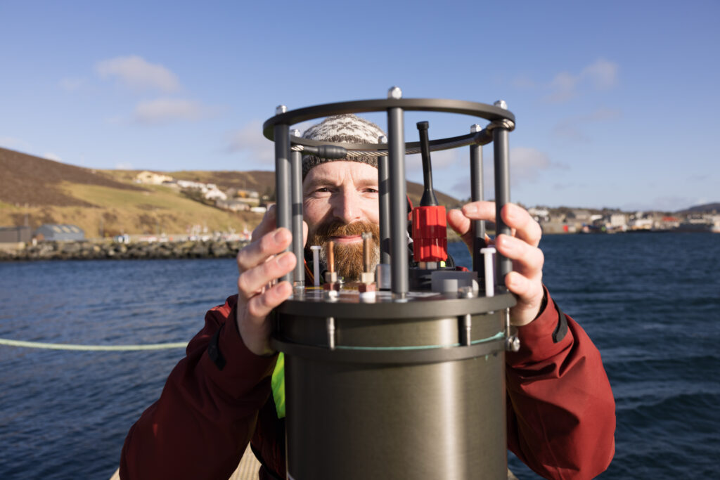 Gregg Arthur Aquaculture Manager , UHI Shetland here with FlowCytobot, Shetland Picture Credit Ben Mullay /HIE