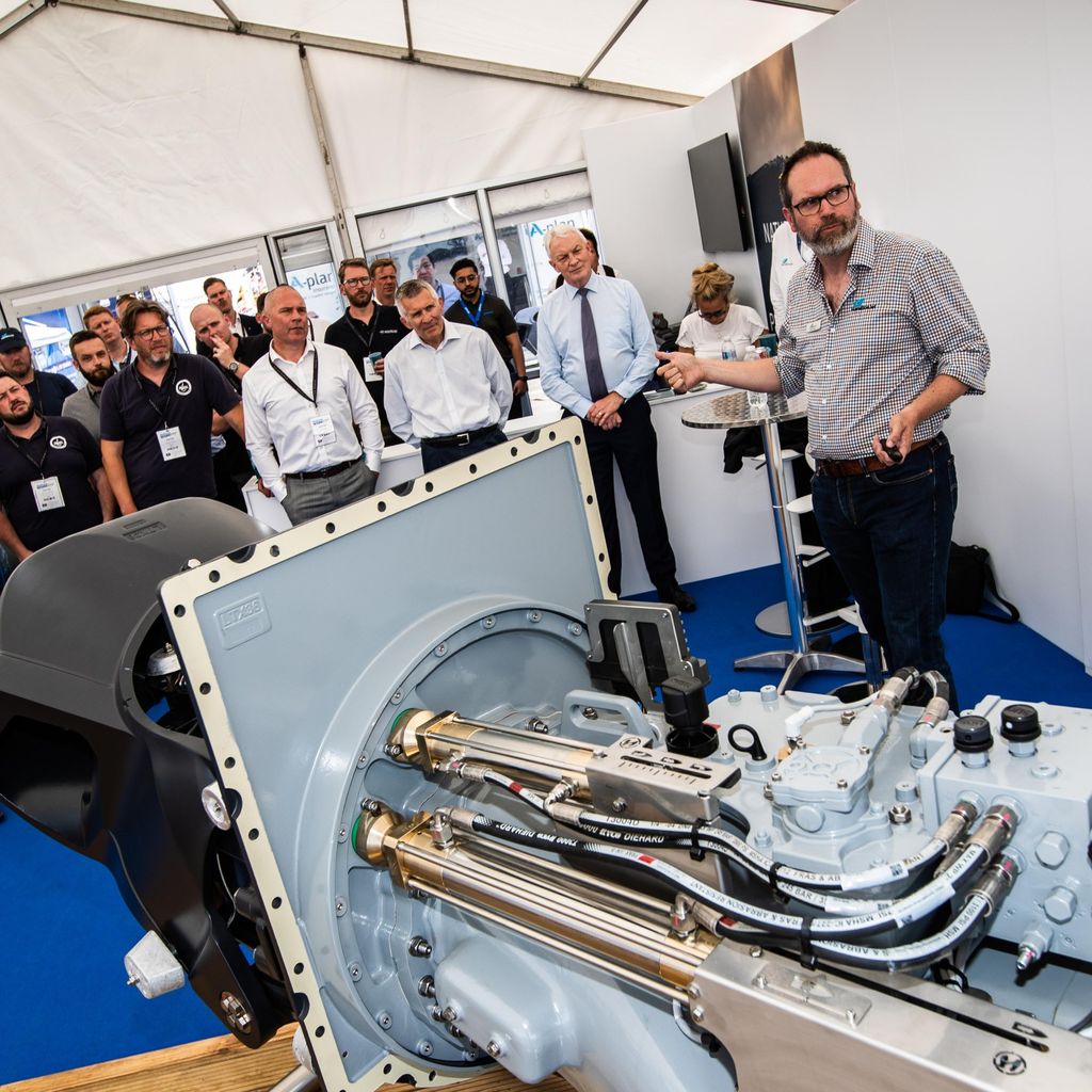 Seawork 2023, a group of people and an engine