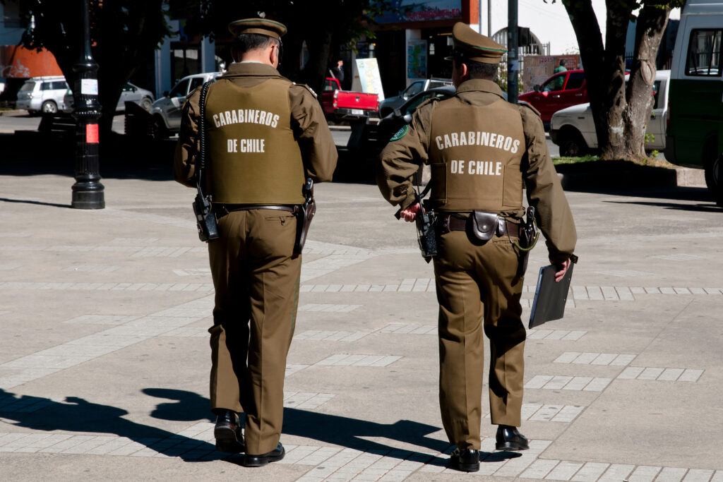 two men in uniform on the street